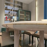 Cream White High-Gloss Dining Table with Rounded Corners and Architectural Gold Metal Bas